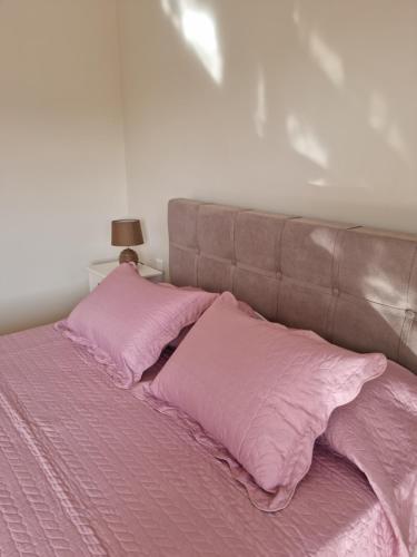 Postel nebo postele na pokoji v ubytování Ma Maison Rose
