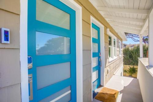 a blue door on a house with a porch at Ocean Beach Retreat 2BR Newly Remodeled, 2 Blocks to Sand and Shops in San Diego