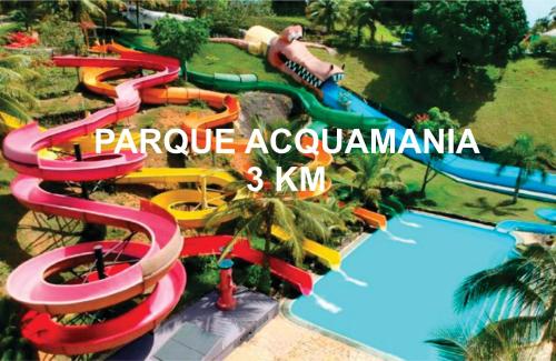 an image of a water park with a water slide at Apartamento Ponta da Fruta para até 4 pessoas 201 in Vila Velha