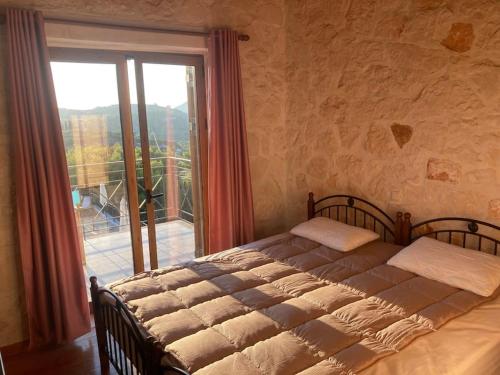 Cama ou camas em um quarto em Villa Flora