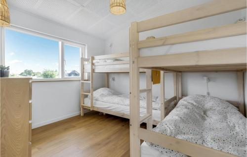 Ein Bett oder Betten in einem Zimmer der Unterkunft Stunning Home In Odder With Wifi