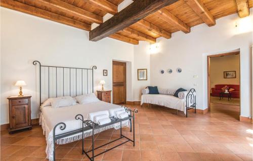 a large bedroom with a bed and a couch at Egidio in Vigne