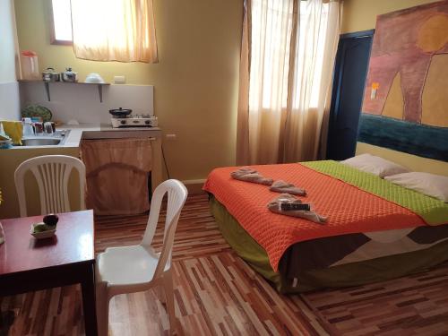 Una cocina o zona de cocina en Mí Oficina