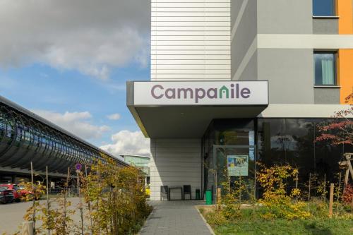 a building with a sign that reads camanderille at Campanile Leipzig Halle Airport in Leipzig