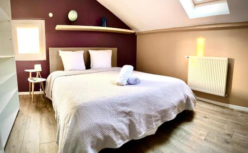 מיטה או מיטות בחדר ב-Logement indépendant 1 à 2 chambres, idéal séjour Bourg en bresse