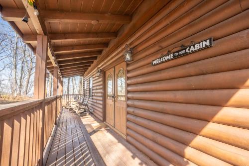 a house for sale with a wooden wall at Comfort Cabin Bearway To Heaven w Private Hot Tub in Pigeon Forge