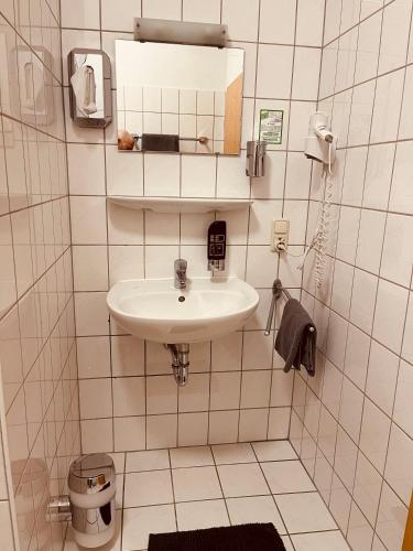 Koupelna v ubytování Gasthof Hotel Bräustübl