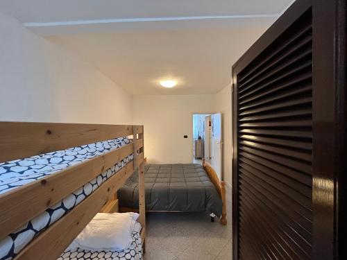 En eller flere senge i et værelse på Casina in Spiaggia