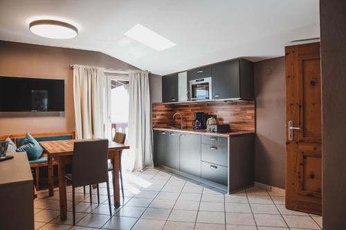 Kuchyň nebo kuchyňský kout v ubytování Residence Montani
