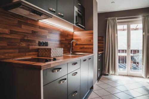 Kuchyň nebo kuchyňský kout v ubytování Residence Montani