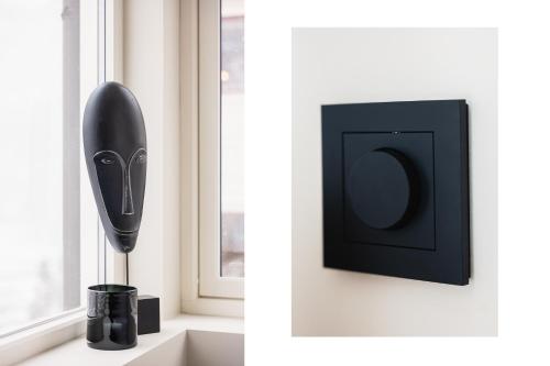 a black hair dryer sitting next to a window at Odda View in Odda