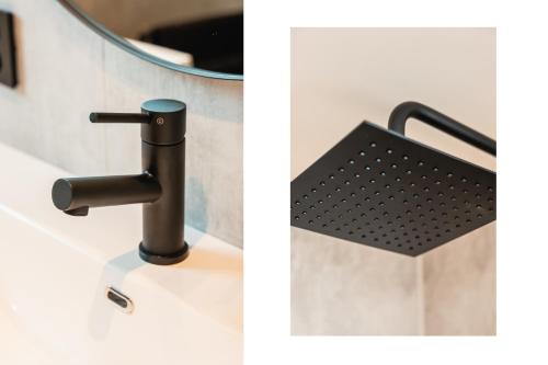 a bathroom with a black faucet and a sink at Odda View in Odda