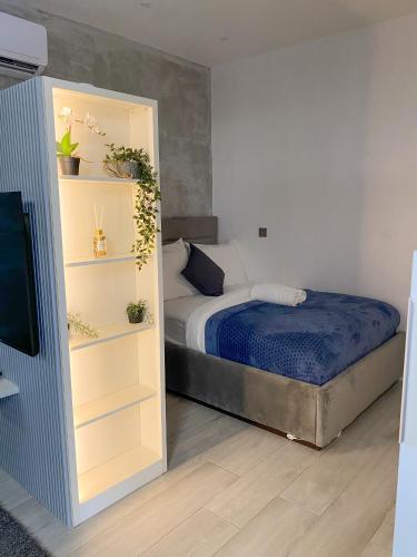 Кровать или кровати в номере GidiStays - Zen Studio Apartment - The Courtyard Lekki 1