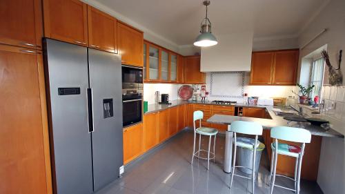 Kuchyň nebo kuchyňský kout v ubytování Chill & Bond House, Alvor