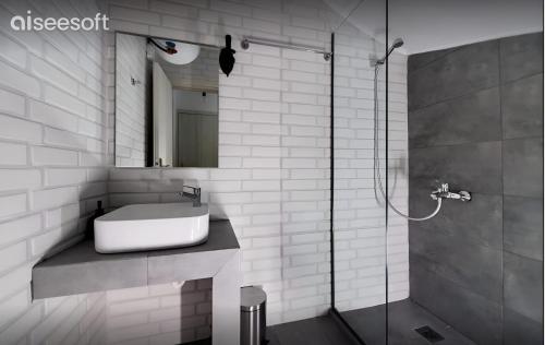 Ένα μπάνιο στο Melodia Apartments by Imagine Lefkada