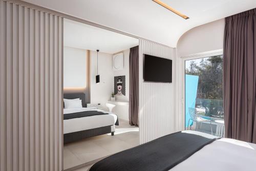Posteľ alebo postele v izbe v ubytovaní Mirada Hotel