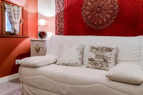 A bed or beds in a room at La Petite Maison de Villecroze