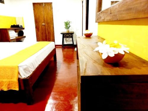 Postel nebo postele na pokoji v ubytování Coco Garden Villas 1