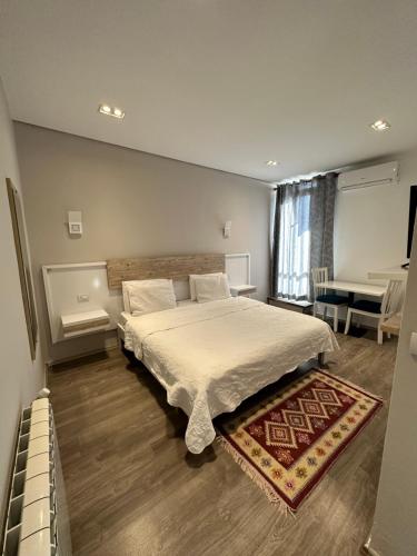Ένα ή περισσότερα κρεβάτια σε δωμάτιο στο Hotel Gjallica