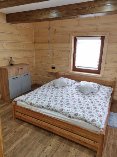 Postel nebo postele na pokoji v ubytování Apartament na krzywym