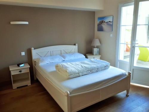Postel nebo postele na pokoji v ubytování Villa de plain pied à 50 mètres de la plage