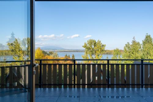 a balcony with a view of the water at AKORD chata in Námestovo