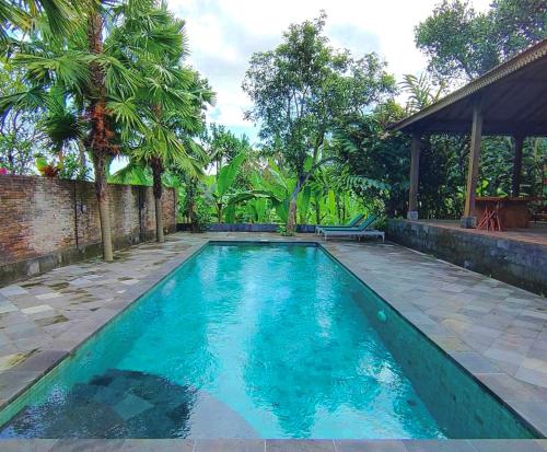 La alberca dentro o cerca de Alas Arum Ecolodge