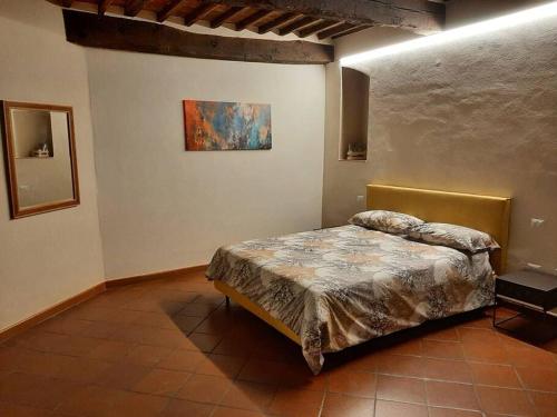 Ein Bett oder Betten in einem Zimmer der Unterkunft La Finestra Sul Corso