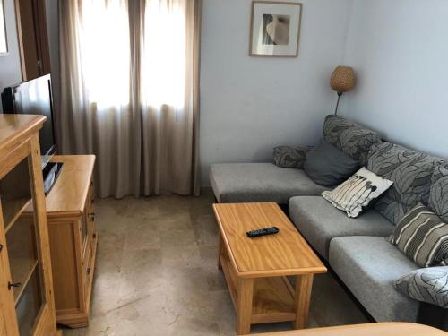 TV a/nebo společenská místnost v ubytování Apartamento en Conil cerca de Playa y Centro