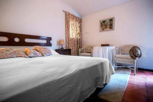 Postel nebo postele na pokoji v ubytování Casa do Bosque