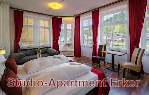 Giường trong phòng chung tại MoselUnion - Aparthotel Landsknecht