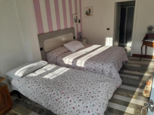 - une chambre avec 2 lits dans l'établissement podere il sorriso degli angeli, à Pistoia