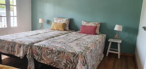 Ένα ή περισσότερα κρεβάτια σε δωμάτιο στο Maison de famille