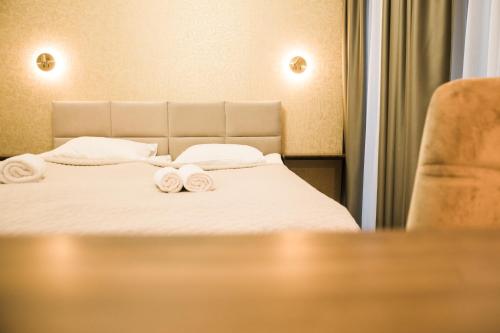 Postel nebo postele na pokoji v ubytování DHARMA Stay APARTAMENTAI Self check-in