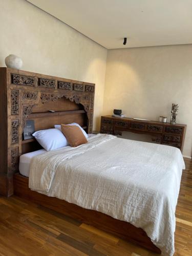 Postel nebo postele na pokoji v ubytování Casa Realm