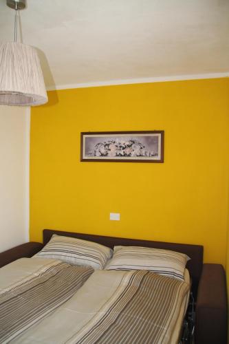 Postel nebo postele na pokoji v ubytování Casa Gialla