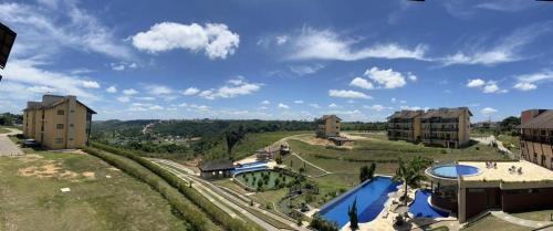 an aerial view of a resort with a swimming pool at Apartamento no Condomínio Sonhos da Serra - Bananeiras in Bananeiras
