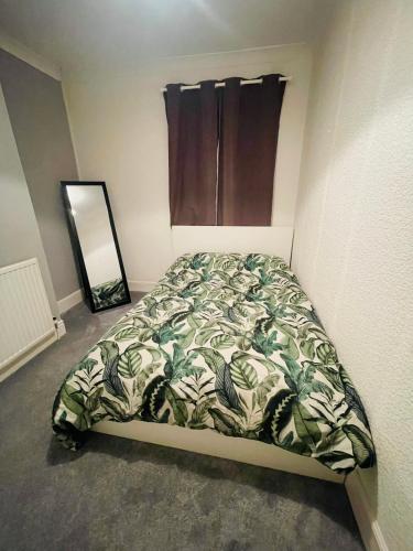 Voodi või voodid majutusasutuse Shou’s guest house toas