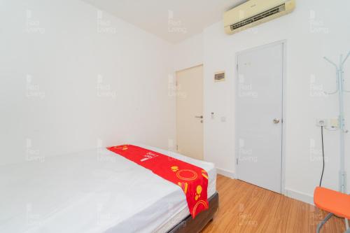 Letto o letti in una camera di RedLiving Apartemen Aeropolis - Ivan Tower AR1