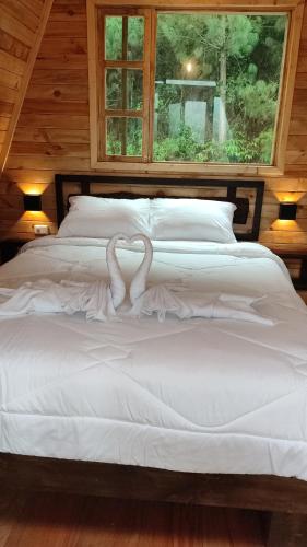 Cama o camas de una habitación en Los Alpes 3