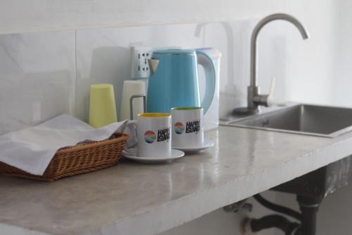 Kuchyň nebo kuchyňský kout v ubytování Happy Island Inn