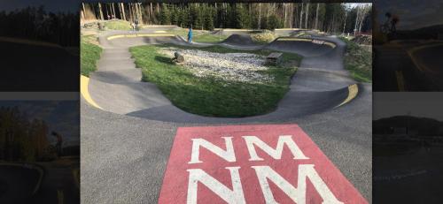 a skate park with a ramp with the word nim on it at Apartmán Aneta Nové Město na Moravě in Nové Město na Moravě