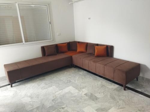 Ein Sitzbereich in der Unterkunft Yasmine appartement A7