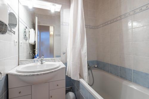Kúpeľňa v ubytovaní Le Caribou - Appt 3 chambres proche pistes
