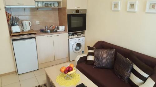 Η κουζίνα ή μικρή κουζίνα στο Harmony Hills Family Apartments