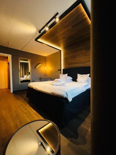 Katil atau katil-katil dalam bilik di Palm Tree Hotel, Best Western Signature Collection