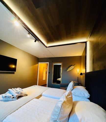Katil atau katil-katil dalam bilik di Palm Tree Hotel, Best Western Signature Collection