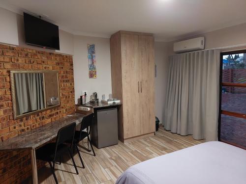 Katil atau katil-katil dalam bilik di Twins Guest House Astoni