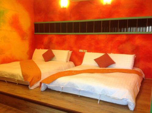 Postel nebo postele na pokoji v ubytování Kenting Sun & Sea B&B
