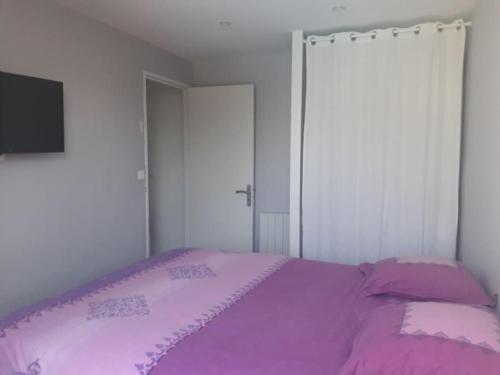 Posteľ alebo postele v izbe v ubytovaní Logement tout neuf avec piscine et bord de mer